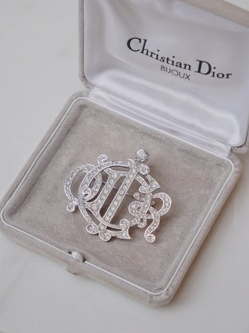 Chr Dior logo brooch embellished with rhinestones (Vintage)